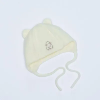 Vilaurita merino vilnas frotē cepure 55, 38 cm.